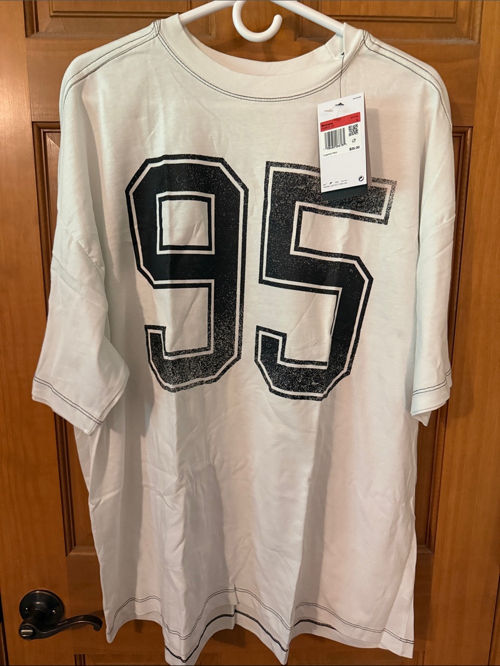 Nike White Short-Sleeve Jersey with Black '95' Graphic